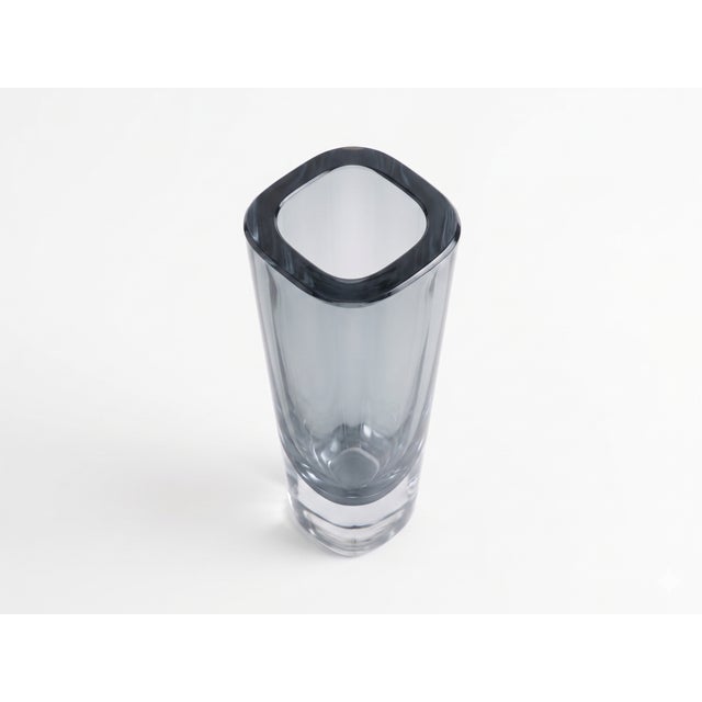 An exquisite example of mid-century Scandinavian minimalism, this heavy crystal vase was produced by the renowned Swedish...
