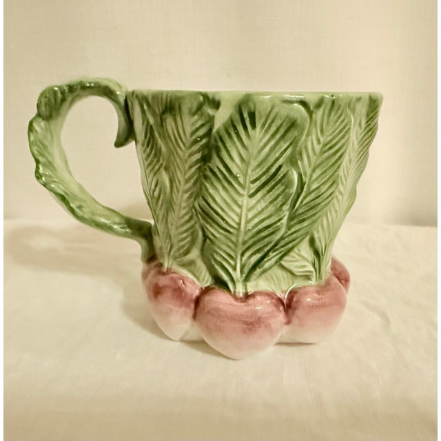 Delight in the charm of the Vintage 1988 Fitz and Floyd Harvest Vegetable Mugs, a beautifully crafted set of four that...