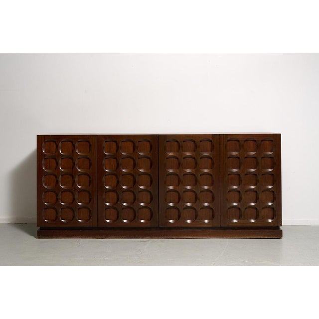 Amazing De Coene brutalist sideboard with 4 doors and 2 drawers inside. This piece is attributed to the mentioned...