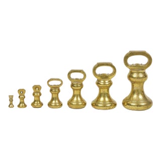 Victorian Set Seven Brass Bell Form Weights For Sale