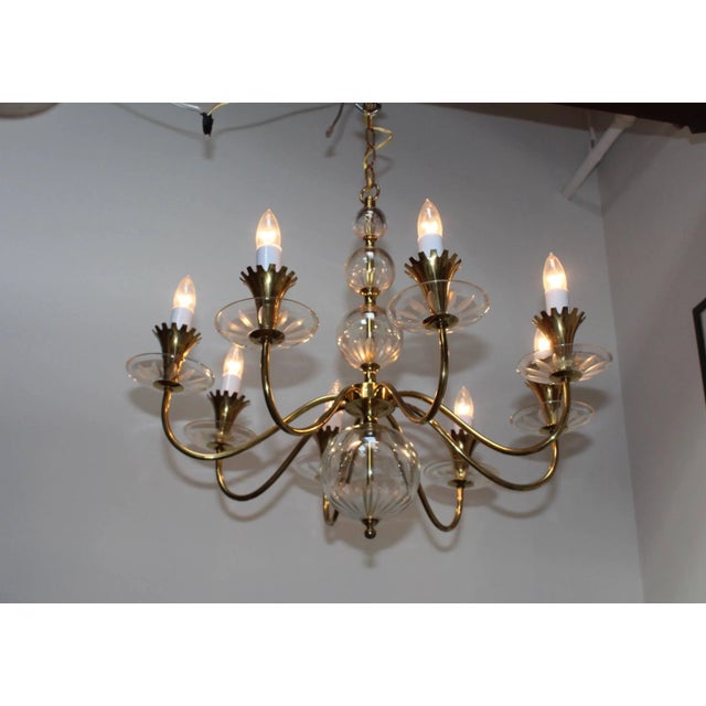 1950s brass with etched glass eight-arm chandelier by Lightolier.
