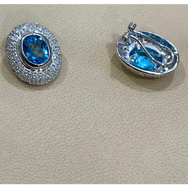 5 Carat Oval Shape Blue Topaz and Diamond Omega Back Clip Earring 14 Karat Gold For Sale - Image 17 of 18