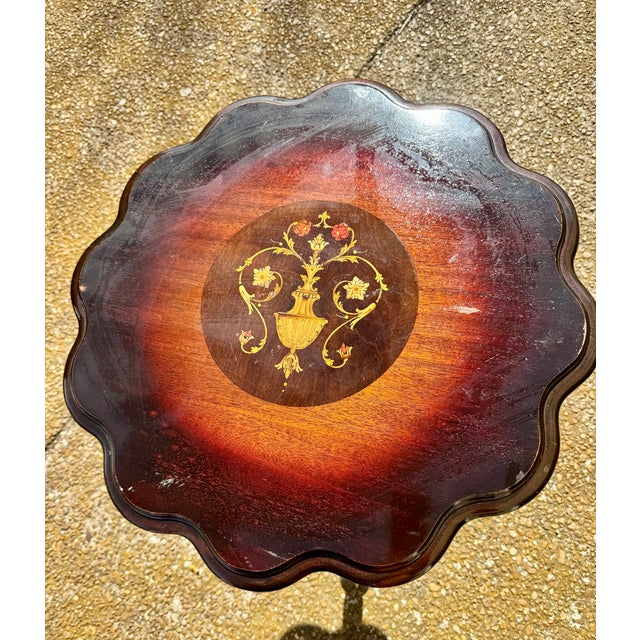 Gorgeous antique tilt top table, featuring an intricate design. Table is in excellent condition, with few marks as...