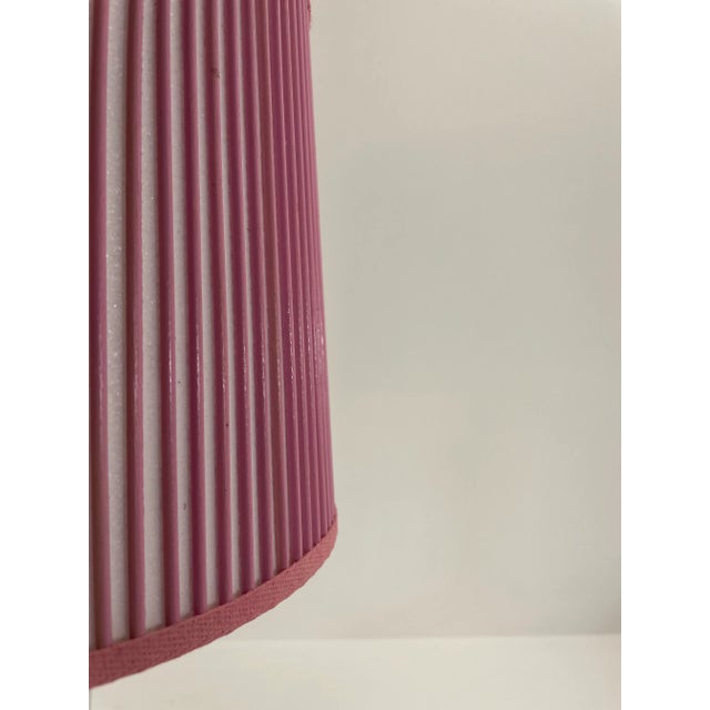 Solid pink sticks are added by hand, one at a time, over artisanal, vellum paper. This Stick Shade will add charm to any...