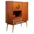 Elegant Italian bar cabinet produced during the late 1950s or early 1960s, exemplifying the refined aesthetic of Mid-...