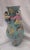 Rare Chinese Fertility Vase. Light blue background with multiple porcelain figures attached. Statement piece on its own or...
