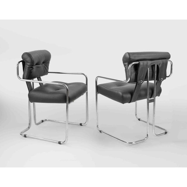 Set of 4 vintage black leather chairs by Guido Faleschini for I4 Mariani, Italy 1970s. Chromed tubular steel. Rare and in...