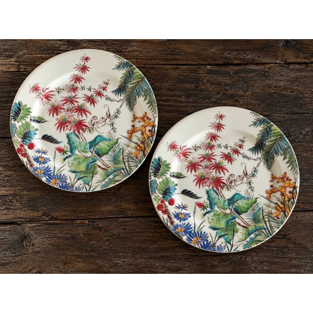 Tiny French plates with a full jungle happening on them. This set of 2 vintage Gien France “Tamarin” small plates features...