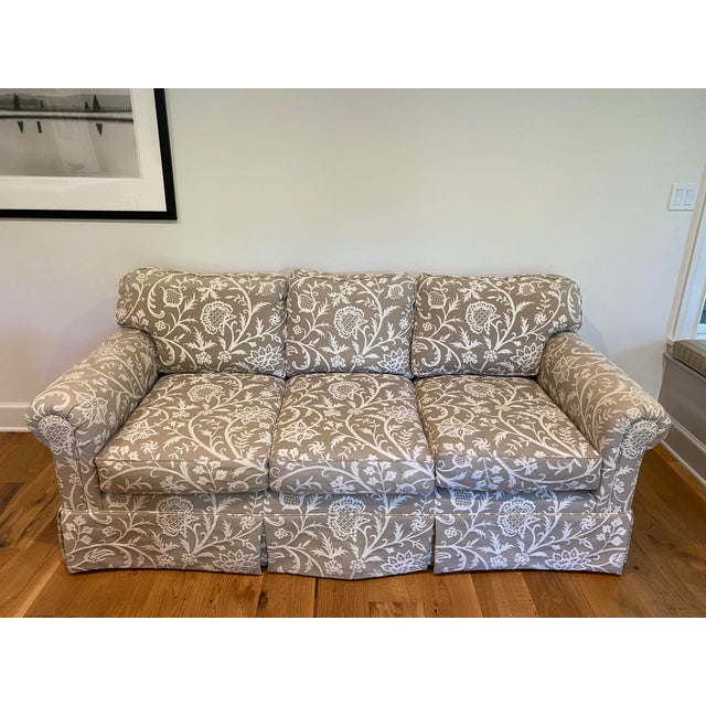 Single custom-made, hardwood sofa upholstered in embroidered designer fabric. Three seat cushions are spring down for...