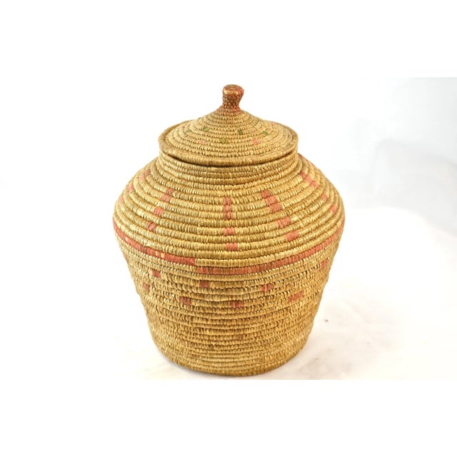 Native American finely woven lidded jar in natural with aqua-green and magenta accents. Wonderfull in a country farmhouse...