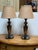 Design Pous Gallery presents a Pair of Blackened Metal Table Lamps with Etched Japanese Landscapes. The lamp are in the...