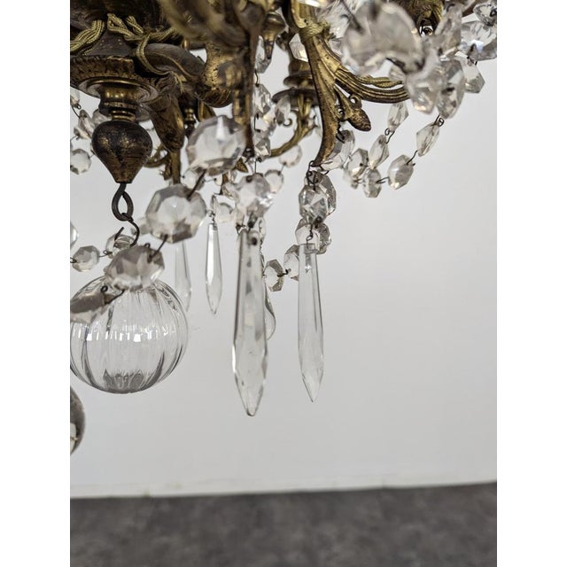19th Century Crystal and Bronze Chandelier, in Very Good conditions. Up to 250V (Europe/UK Standard).The wiring of this...