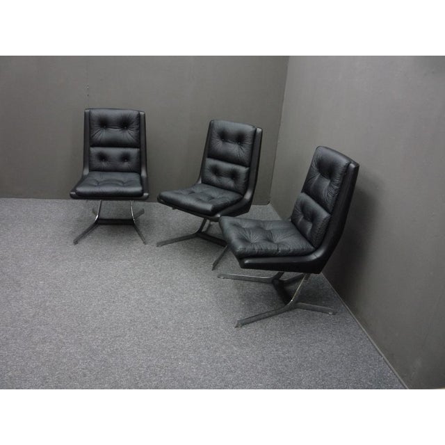 Futuristic armchair from the sixties. There are 3 identical chairs available. They come from a holiday apartment and have...