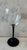 Set of 5 vintage black stem wine glasses made by Luminarc in France. Glasses feature a clear bowl contrasting with a...