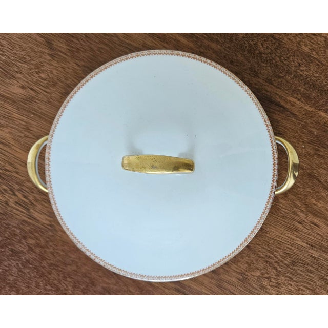 Beautiful antique tureen made in Limoges, France by maker Tressemann & Vogt (circa 1907-1919). Color is white, with gold...