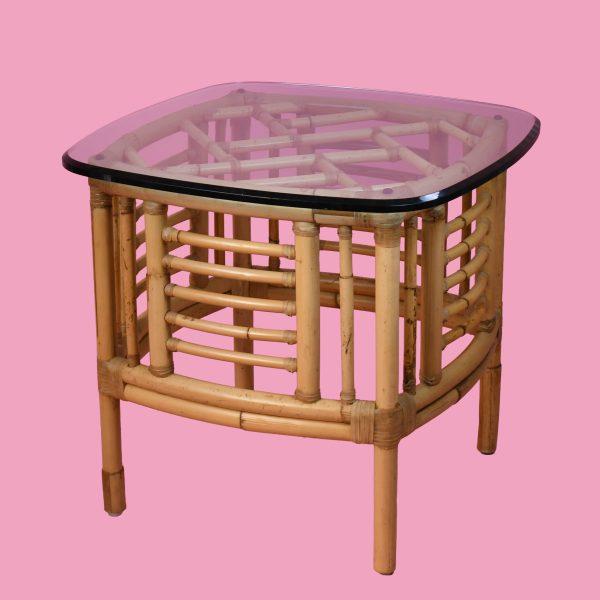 Add exotic elegance to your living space with this pair of fretwork burnt bamboo glass top end tables. The intricately...