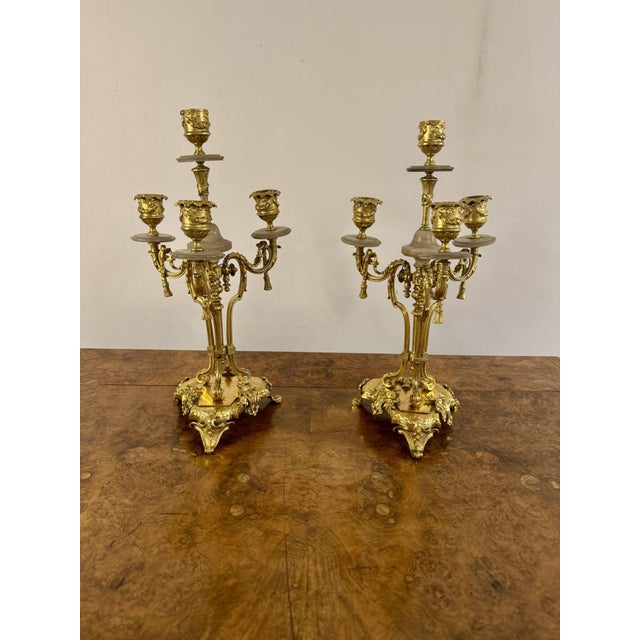 Magnificent quality pair of antique 19th Century candelabras having a stunning quality pair of 19th century candelabras...