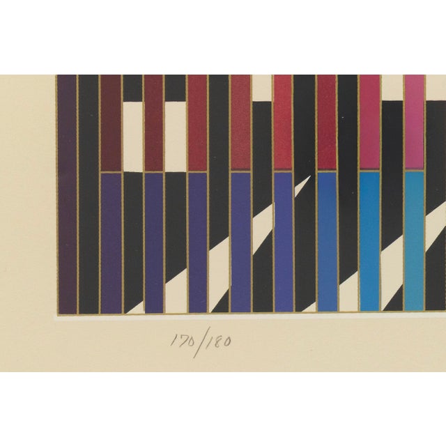 An modern serigraph on paper titled "Sparkling Night Rainbow" by Yaacov Agam. Hand signed in pencil on the lower right...