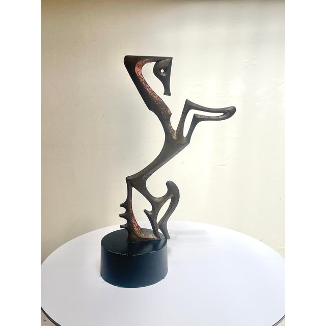 Extremely rare Frederic Weinberg -style sculpture on base of a rearing horse. Brass finish with touches of red patina....
