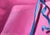 Pink Package by Sarah van der Helm | Oil on Cradled Panel close-up of a pink gift wrapped with blue ribbon For Sale - Image 4 of 4