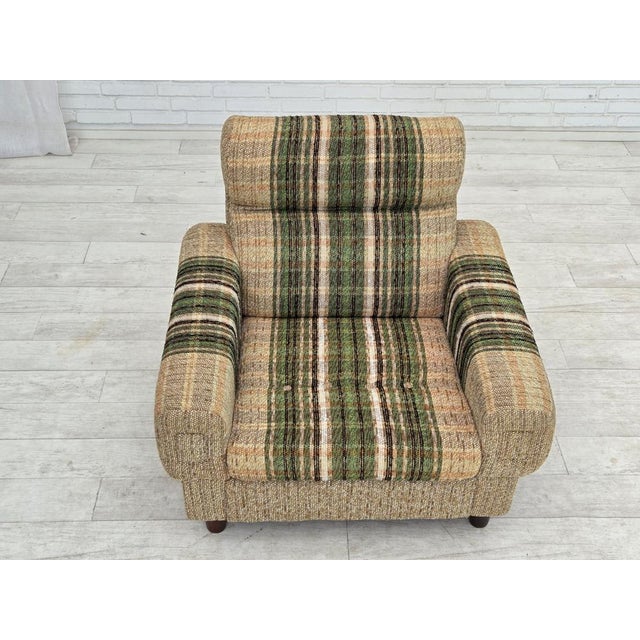 1980s, Danish club chair by Nisbo Horsens. Striped lig brown/ green furniture wool, beech wood legs. Original good...