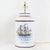 This rare pair of vintage tole table lamps features a classic metal construction with a smooth, hand-painted finish...