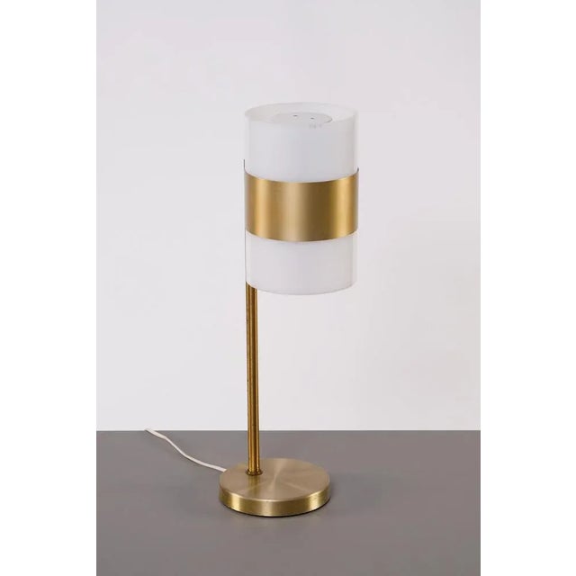 Rare model. Brass and acrylic. Produced by Luxus, Sweden, 1960s. Measure: Height 57 cm. This piece is attributed to the...