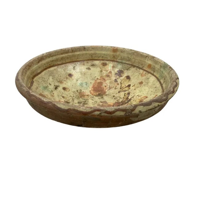 This antique terra cotta decorative bowl from Hungary is a wonderful addition to any Farmhouse decor. The rustic piece...