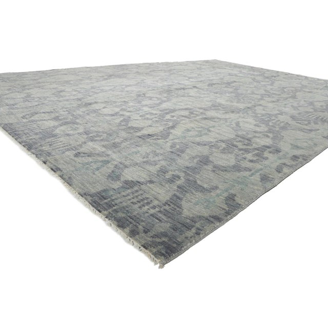 30263 Vintage Blue Transitional Ikat Rug, 09'11 X 14'00. This exquisite hand-knotted wool transitional Ikat rug,...