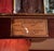 Vintage Ansonia Model 830 “Gold Medallion” triple chime wall clock featuring a rich dark wood case, beveled glass panels,...