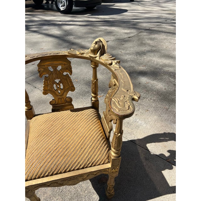 Up for consideration is a beautiful vintage gold wooden corner chair with cushion. This would look lovely in your home and...