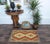 Elevate the elegance of your home with this stunning hand-woven tribal Kilim wool rug. Meticulously crafted on a loom by...