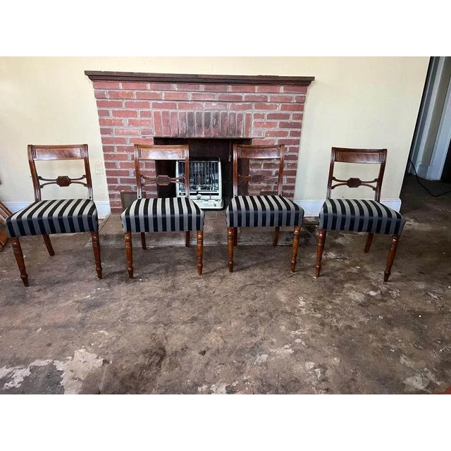 Set of 4 Antique Regency Quality Mahogany Dining Chairs with a carved figured mahogany splat to the centre, turned...