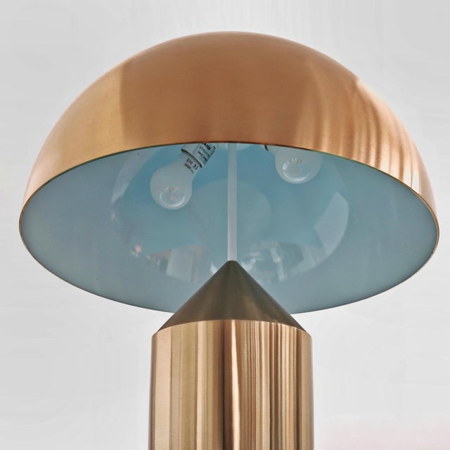 Atollo Table Lamp in Gold Metal by Vico Magistretti for Oluce, 2010s, in Flawless conditions. Designed 1970 to 1979 This...