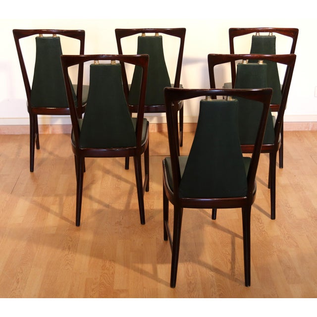 Set of 6 mid-century mahogany chairs with green leather seats. Designed by Osvaldo Borsani, Atelier Varedo Borsani for...