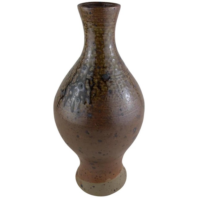 A good quality French mid-20th century ceramic vase with an eye catching form. This very decorative piece features...