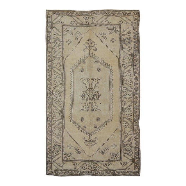 Vintage Cream and Charcoal Turkish Oushak Rug With Stylized Medallion Design For Sale