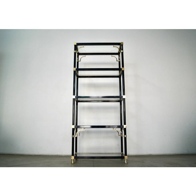 Gorgeous vintage Mid century Modern shelving unit for sale. Manufactured in the 1970's, and very well made. It's made of...