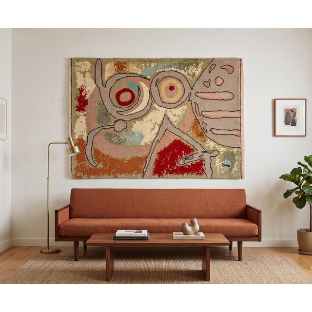 Mid-century French gobelin rug after Joan Miró, bringing a bold “woman and birds” abstract composition into a soft wool...