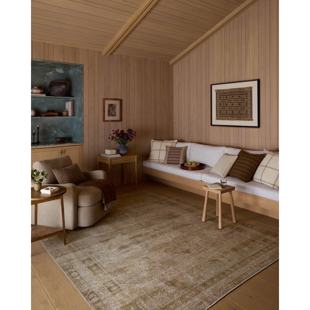 The Cambria Collection is a beautifully executed vintage-style area rug from Amber Lewis x Loloi with a blended jute and...