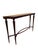 An elegant mahogany console table, featuring a refined design inspired by the style of Paolo Buffa. The frame is supported...