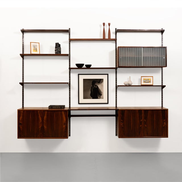This exquisite vintage FM Reolsystem shelving system, designed by the renowned Danish designer Kai Kristiansen, is a true...