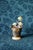 A small "coal bucket" with a handle and platform. Great for brushes, pencil cup, or small planter. Wonderful brown gold...