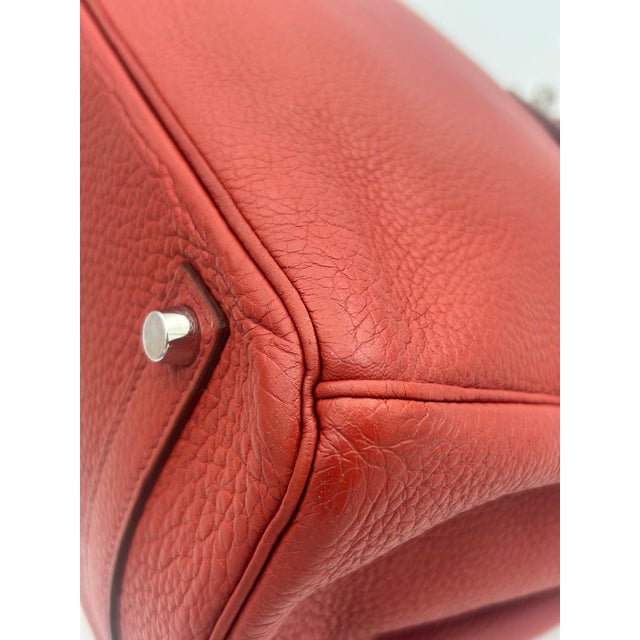 Hermès Red Birkin Bag 35 Togo Leather. Beautiful Birkin bag is in good condition and perfect to elevate any outfit, the...