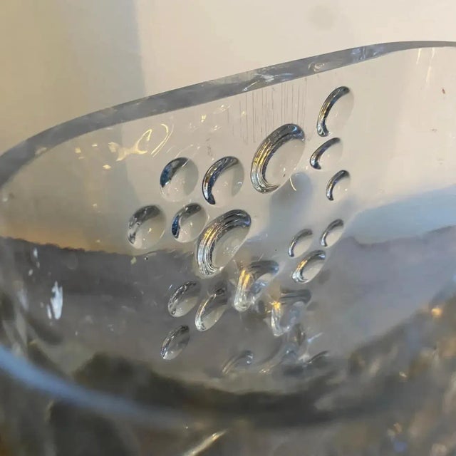 A space age oval heavy glass vase designed and manufactured in Italy in the Seventies in Empoli, small town in Tuscany...