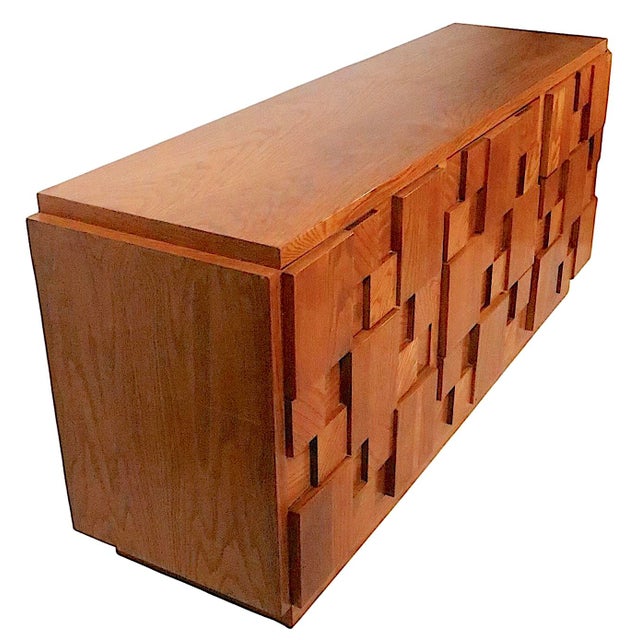 Chic, architectural, nine drawer dresser, made by the Lane Furniture Company as part of the sought after Staccato series,...