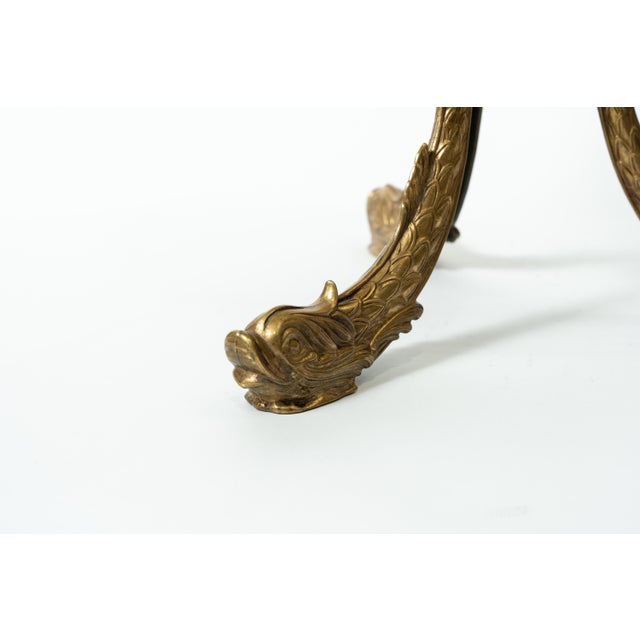This impressive side table, crafted from antique brass, combines the style of the Hollywood Regency era with a koi motif...