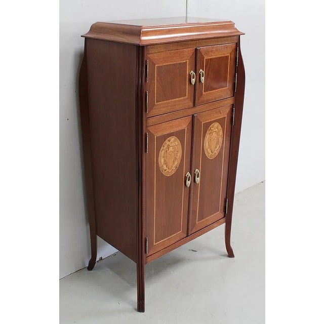 Charming piece of furniture with height of support of Art Nouveau period, composed in high part of two small doors in...