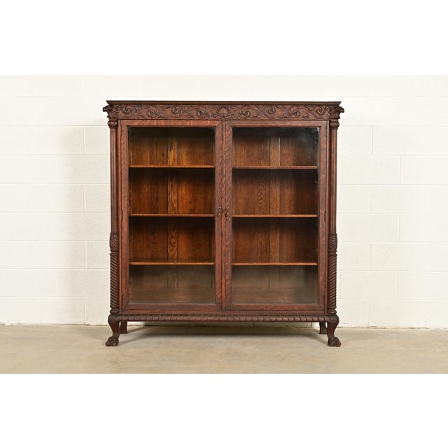 R. J. Horner Style Victorian Oak Double Bookcase With Carved Lion Heads and Paw Feet, Circa 1890s For Sale - Image 13 of 13