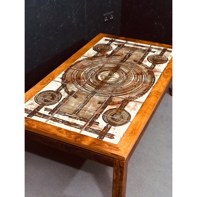 This table was handcrafted by Trioh in Denmark in the ´70s. in rosewood with a tiled top. Trioh manufactured this Ceramic...